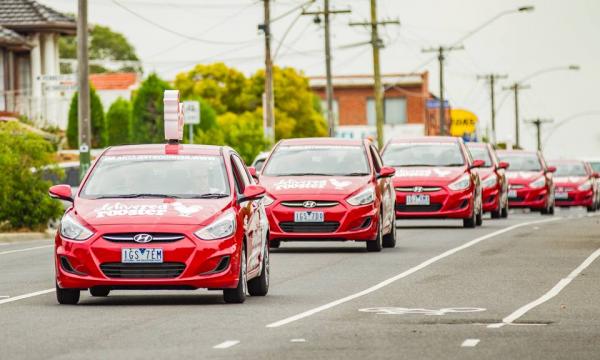 Red Rooster home delivery cars